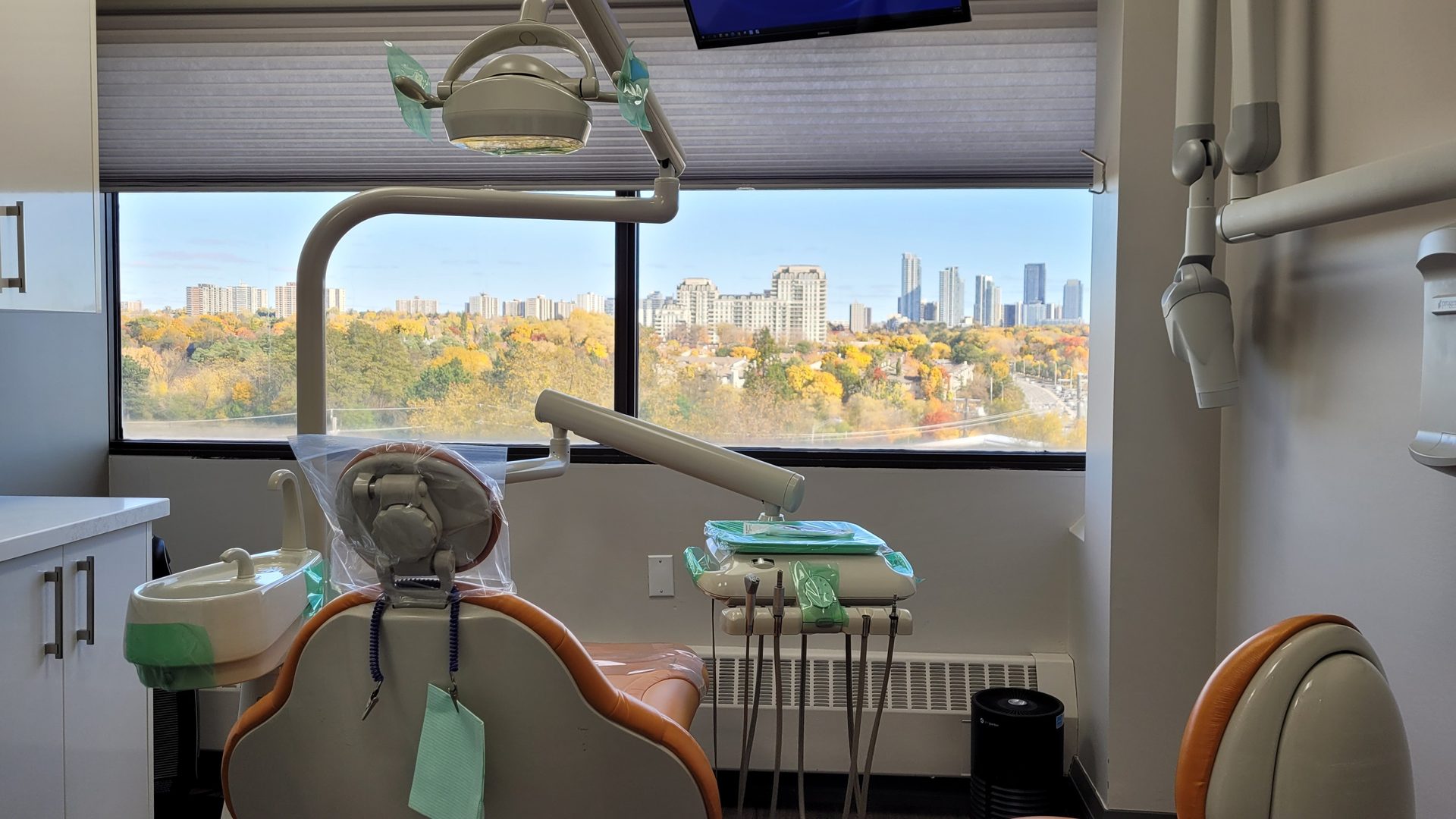 Dental operatory at Baiwei Dental overlooking the Toronto skyline